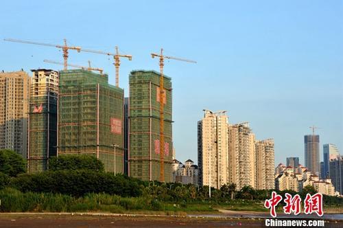 资料图：正在建设中的房地产楼盘。<a target='_blank' href='http://www.chinanews.com/'>中新社</a>记者 张斌 摄
