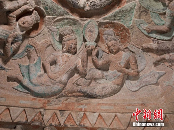 云冈石窟第7窟中簇拥"摩尼宝珠"的飞天伎乐 云冈研究院供图