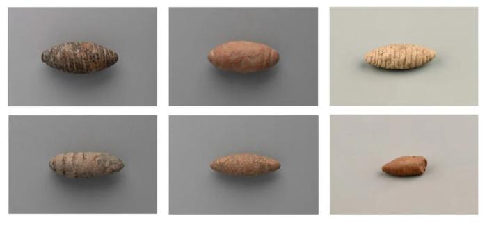 师村遗址出土的石制与陶制蚕蛹。(拼接图片)国家文物局供图