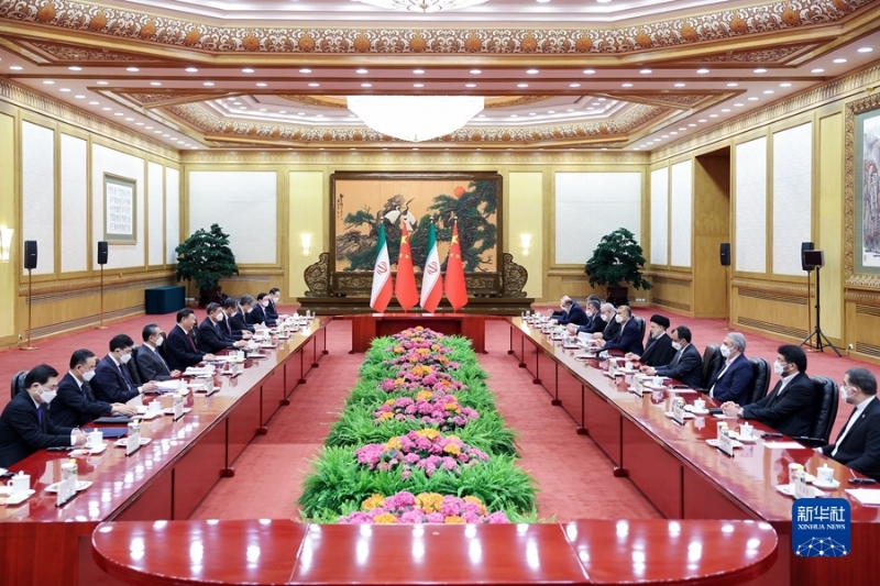 2月14日，国家主席习近平在北京人民大会堂同来华进行国事访问的伊朗总统莱希举行会谈。新华社记者 刘彬 摄