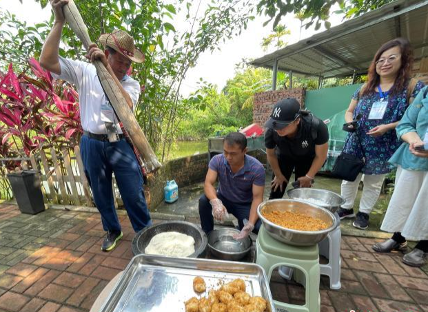 台湾少数民族同胞海南行：一样的民俗风情不可估量的经济腾飞