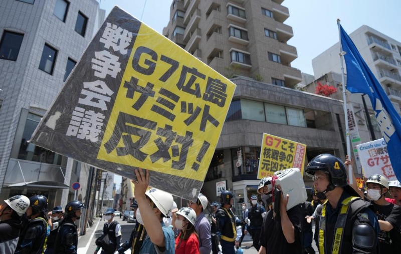 5月21日，民众在日本广岛游行抗议七国集团峰会。新华社记者张笑宇摄